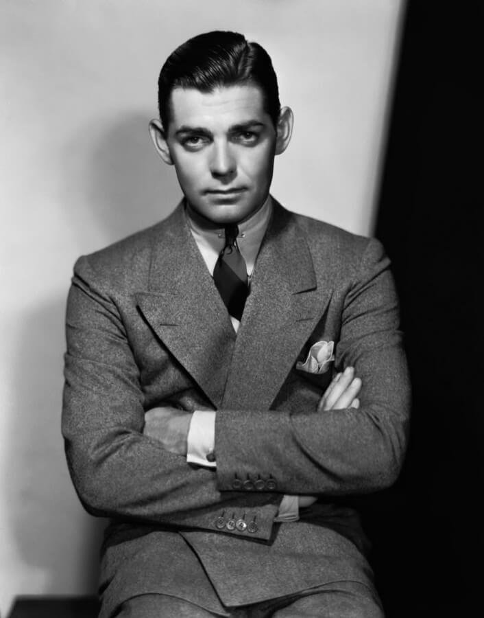 Clark Gable portant un large costume en tweed à revers en pointe