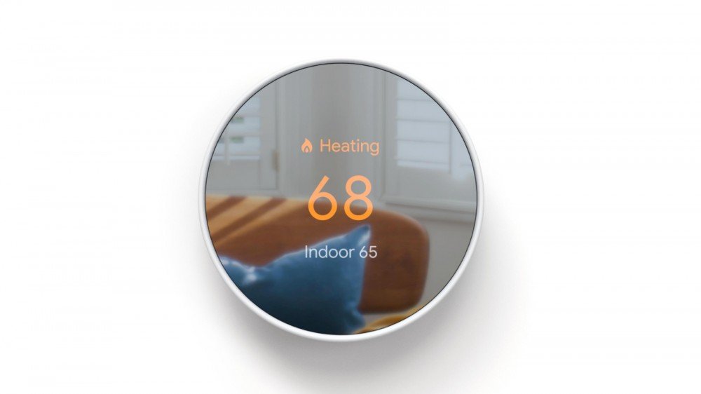 Le nouveau thermostat Nest sur un mur blanc