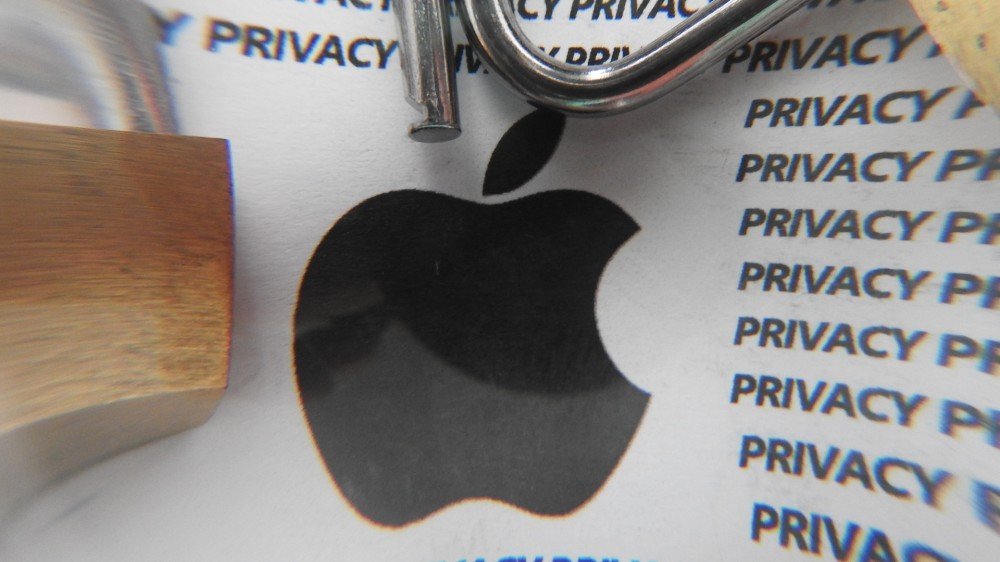 Le logo Apple entouré du mot 