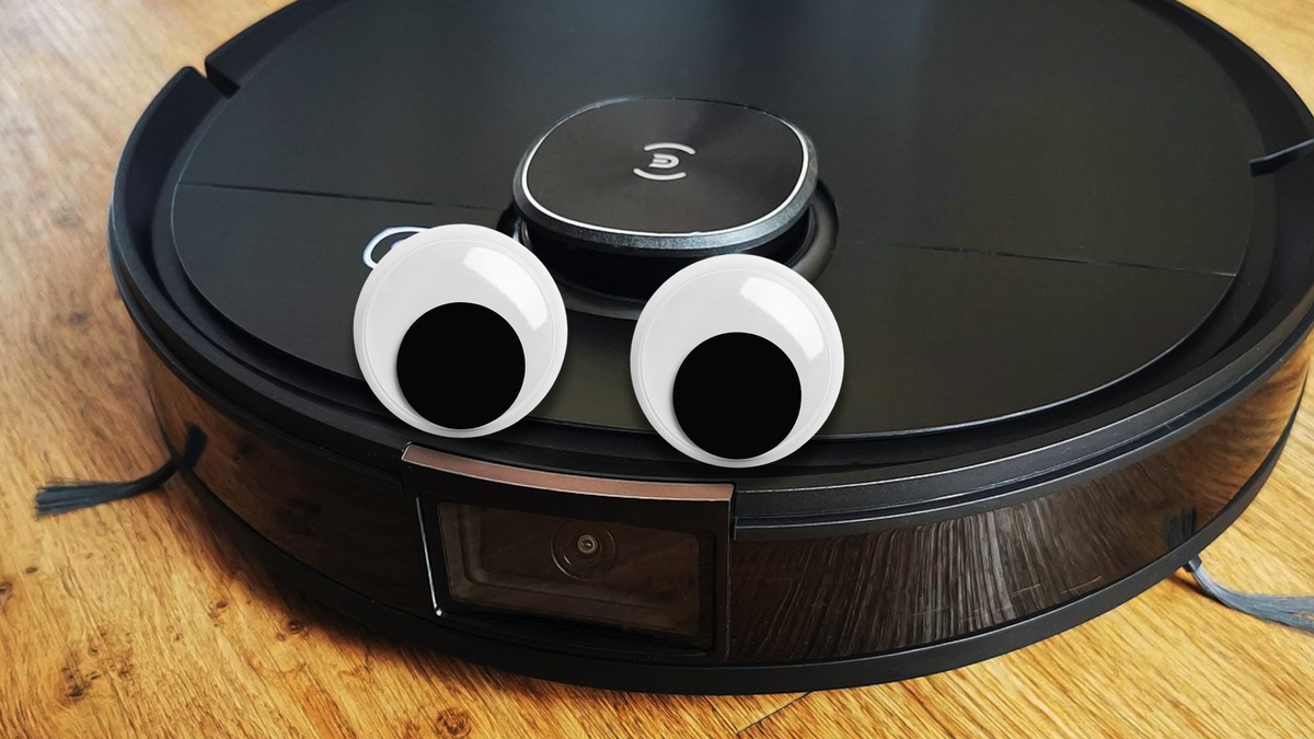 Une paire d'yeux écarquillés sur un robot aspirateur Ecovacs Deebot.