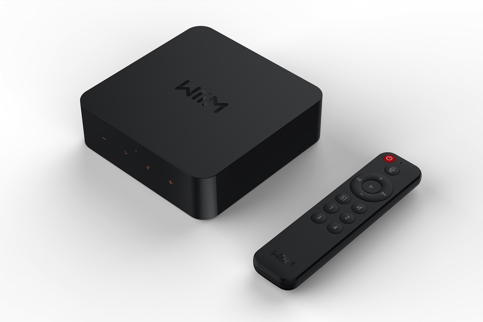 Boîte de diffusion audio et télécommande WiiM Pro Plus.
