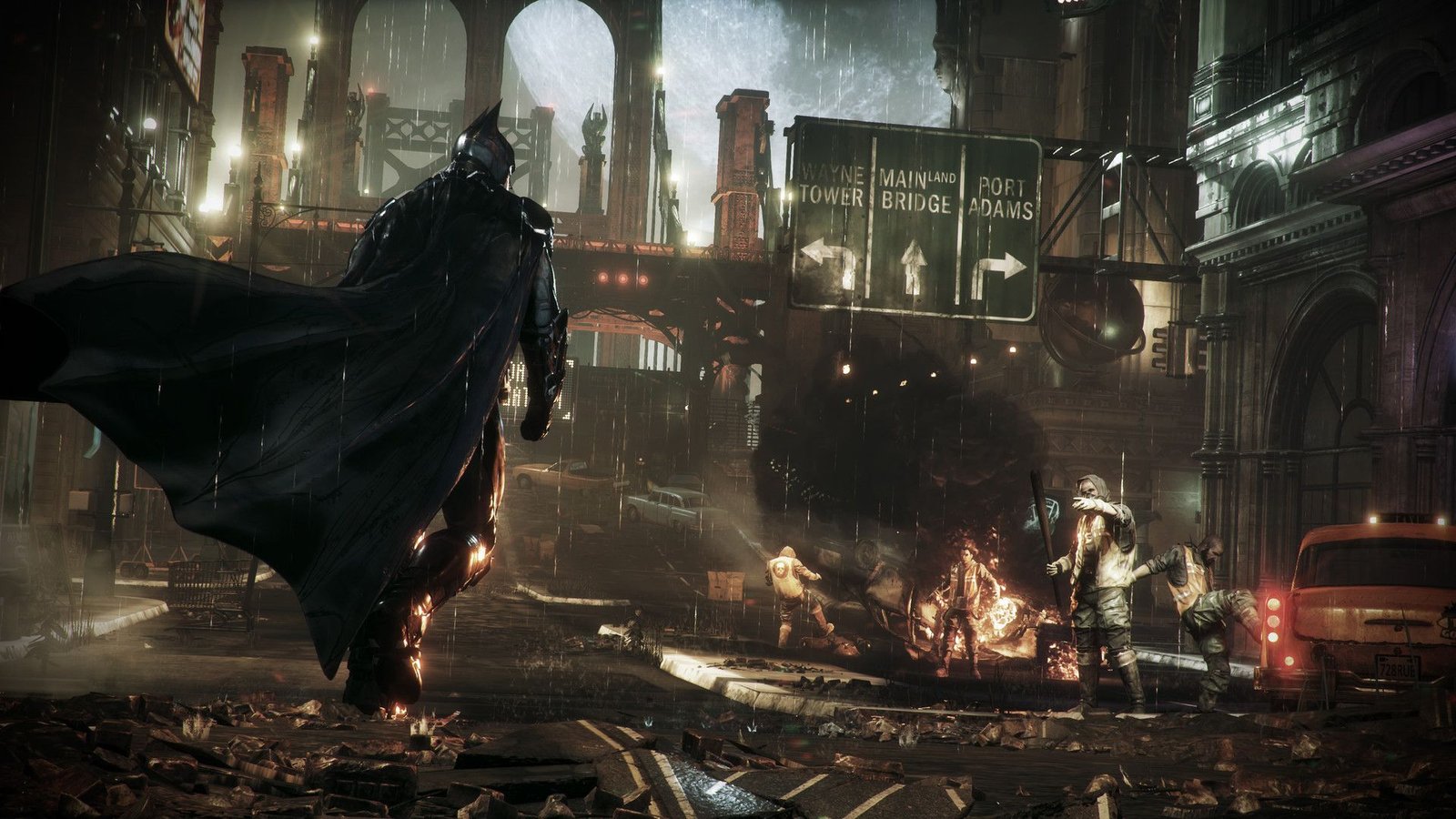 Image officielle de Batman Arkham Knight montrant Batman s'approchant des méchants sous la pluie.