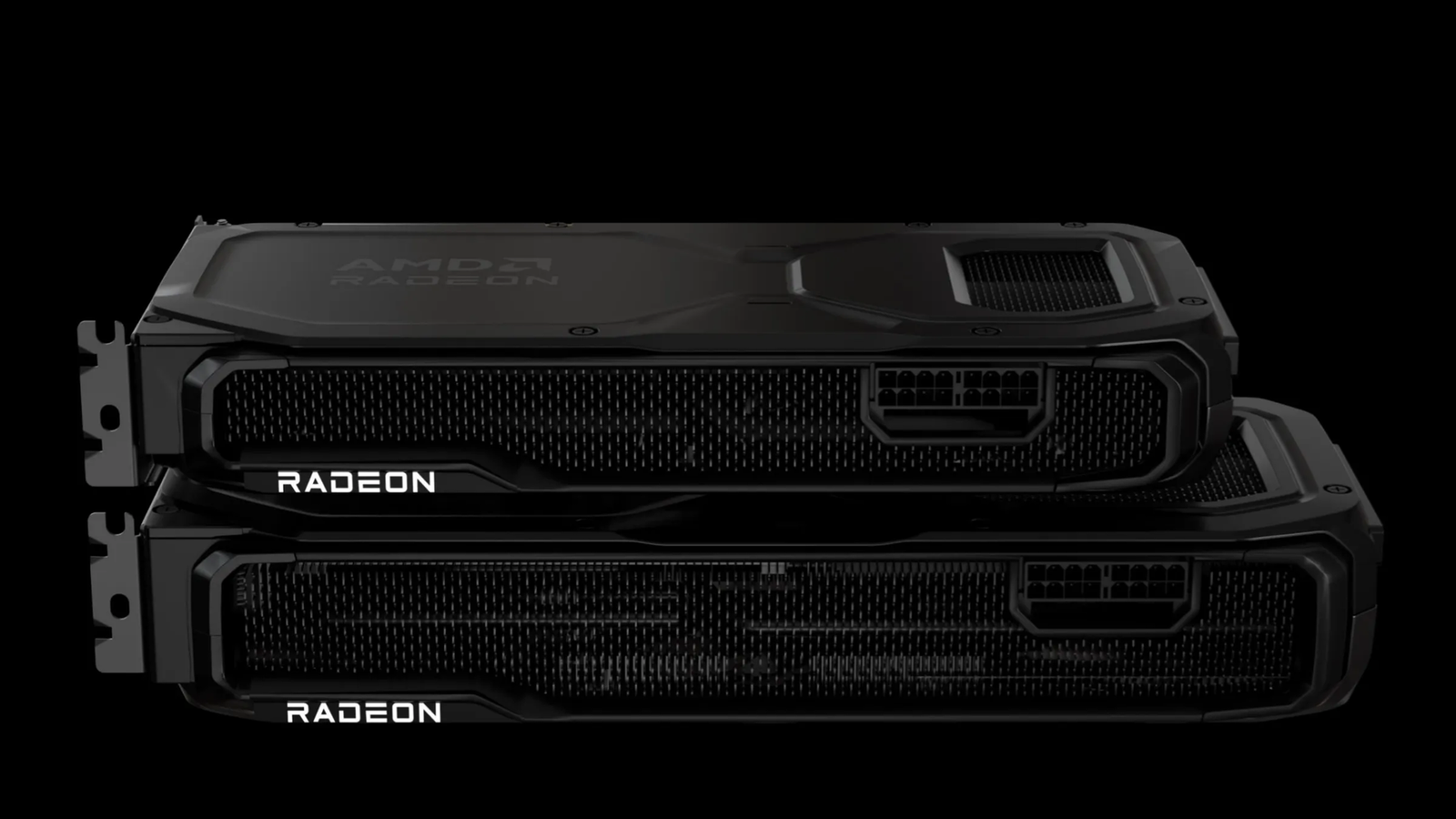 Un RX 9070 XT au-dessus d'un RX 9070, avec des connecteurs d'alimentation montrant. 