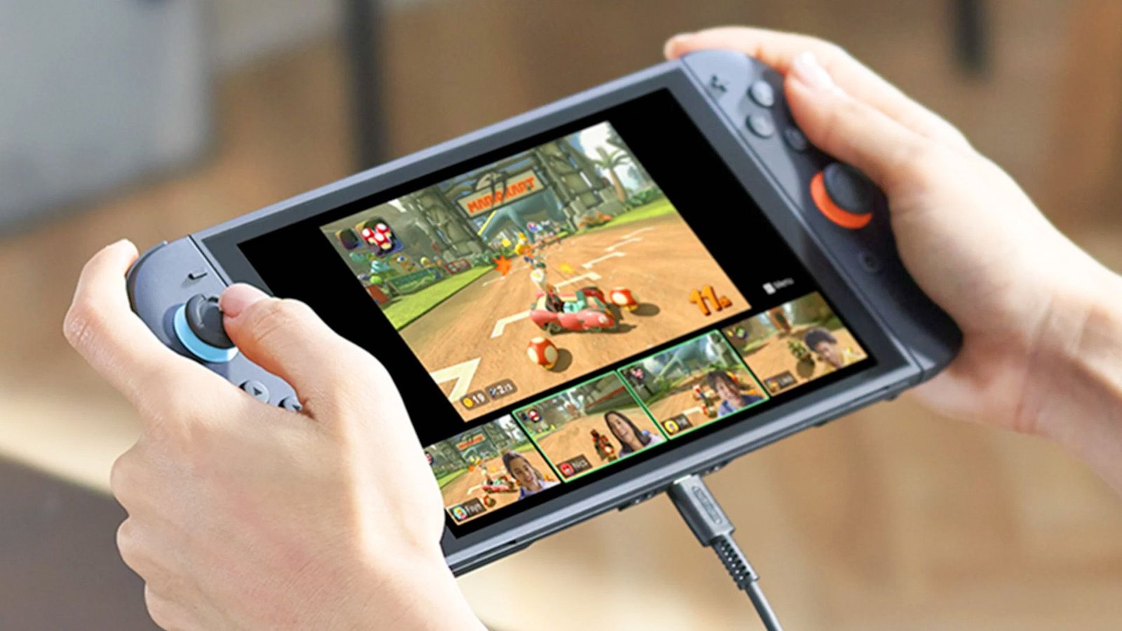 Une personne jouant le Switch 2 en mode portable.