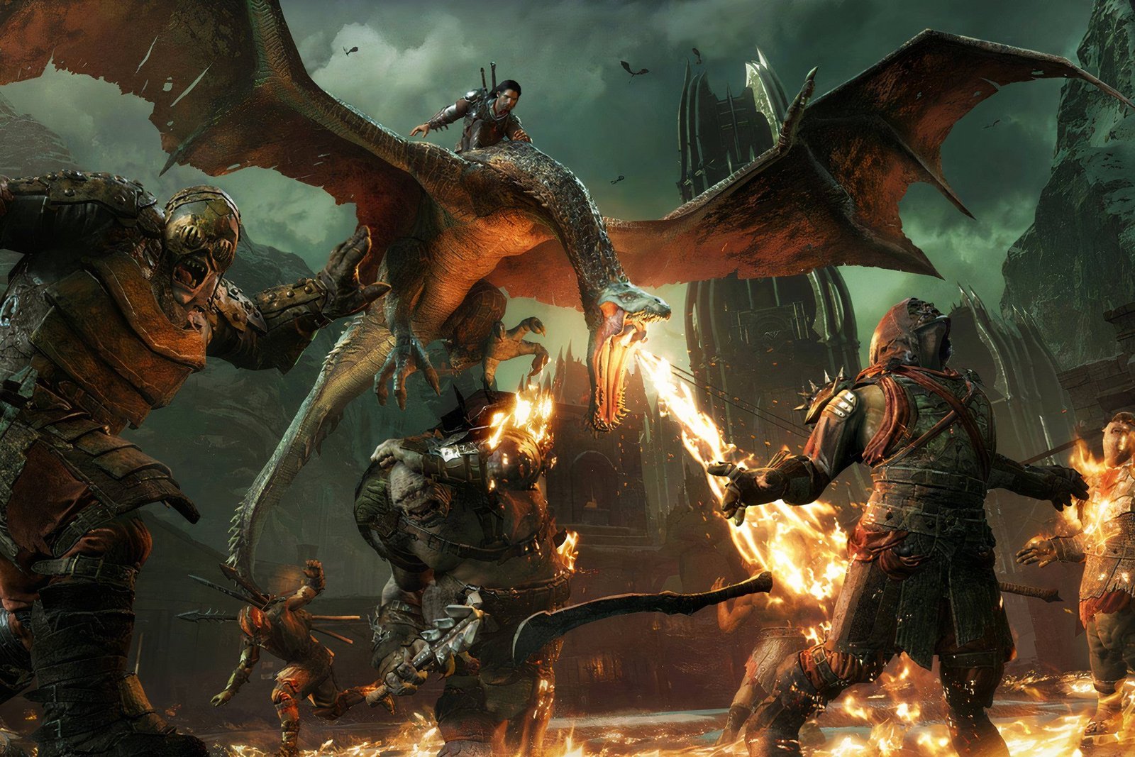 Ombre du milieu de la terre de la guerre Talion chevauchant un Drake et Burning Orcs sur le sol.