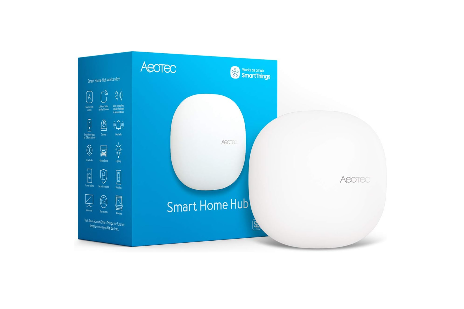 Le centre de maison intelligent Aeotec à côté de son emballage sur fond blanc.