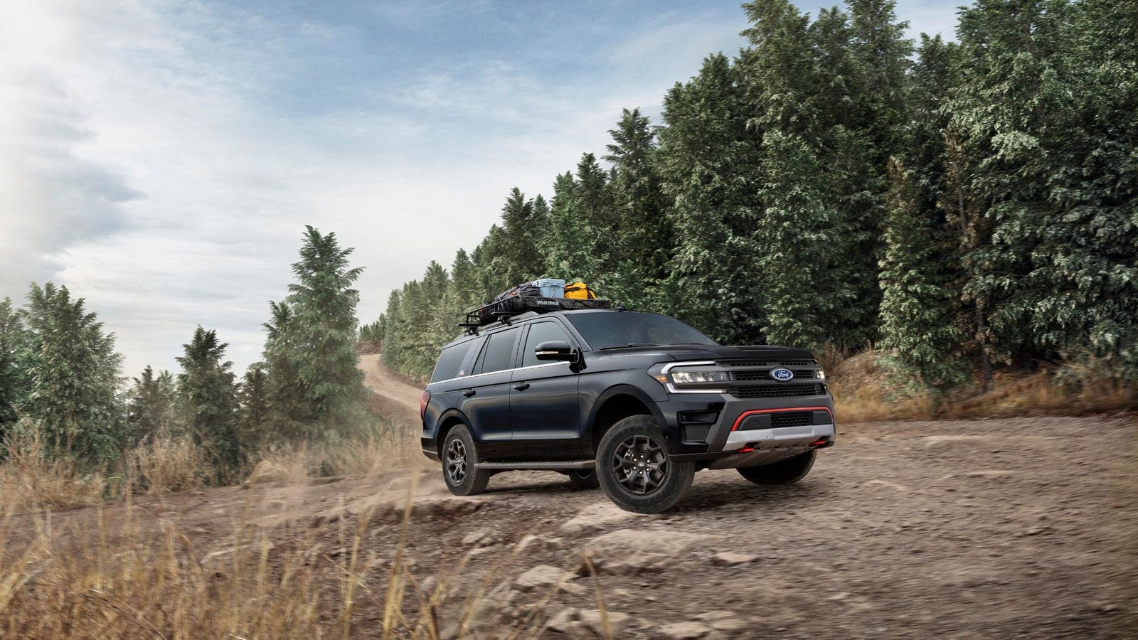 Dynamic Front 3/4 tir d'une Ford Expedition Timberline Ford 2024 hors route avec des arbres en arrière-plan.