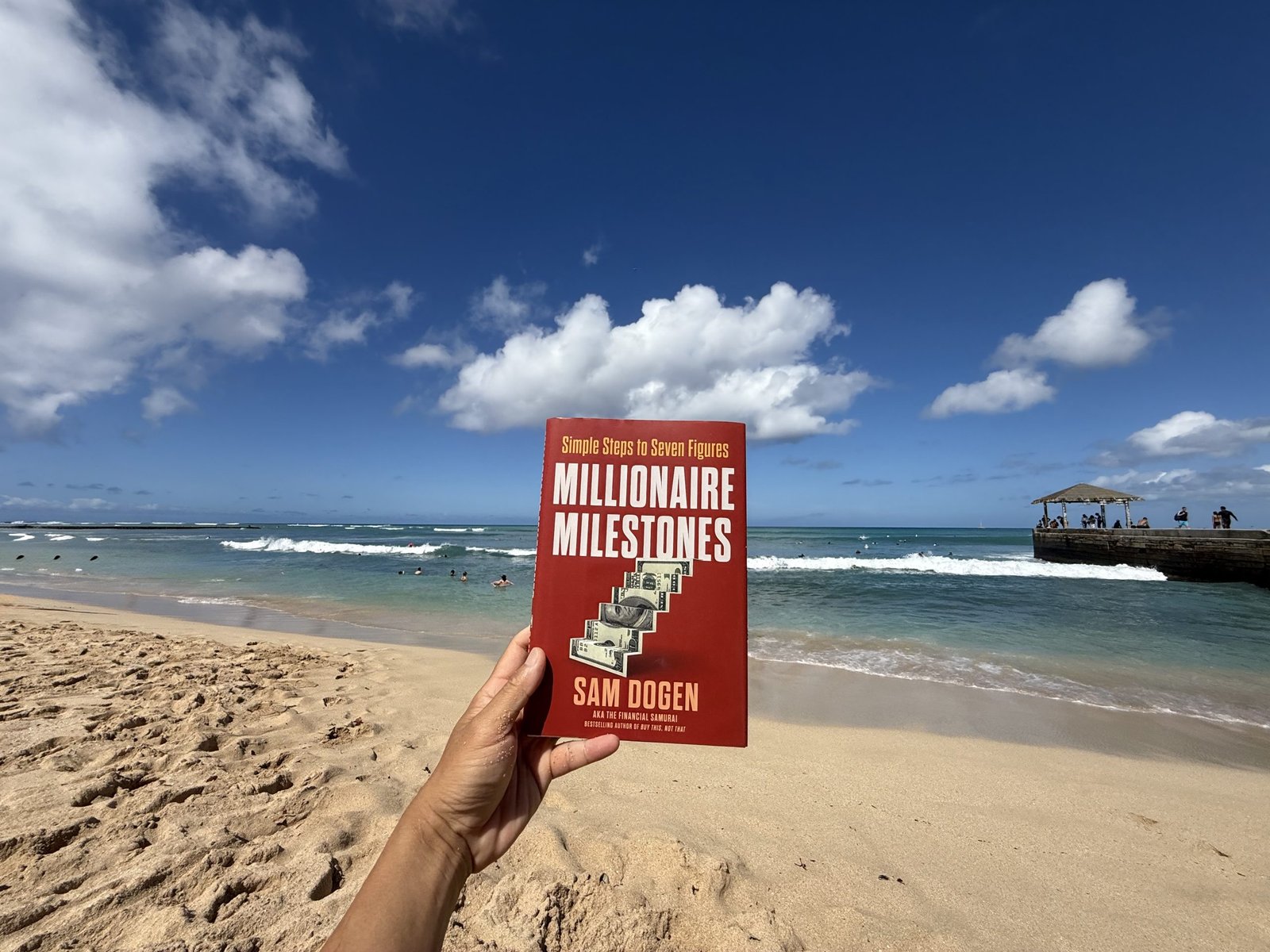 Livre de jalons millionnaires à la plage