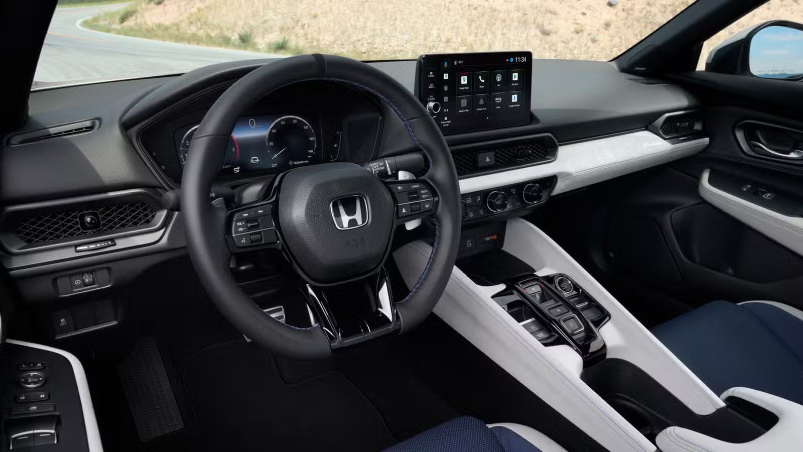 Gros plan de la direction à l’intérieur de l’habitacle d’une Honda Prelude hybride 2026.