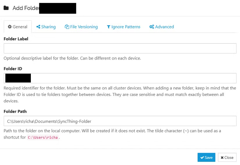 Une capture d'écran de la boîte de dialogue de configuration de Syncthing, dans laquelle un utilisateur sélectionne son dossier Synch et le nomme.