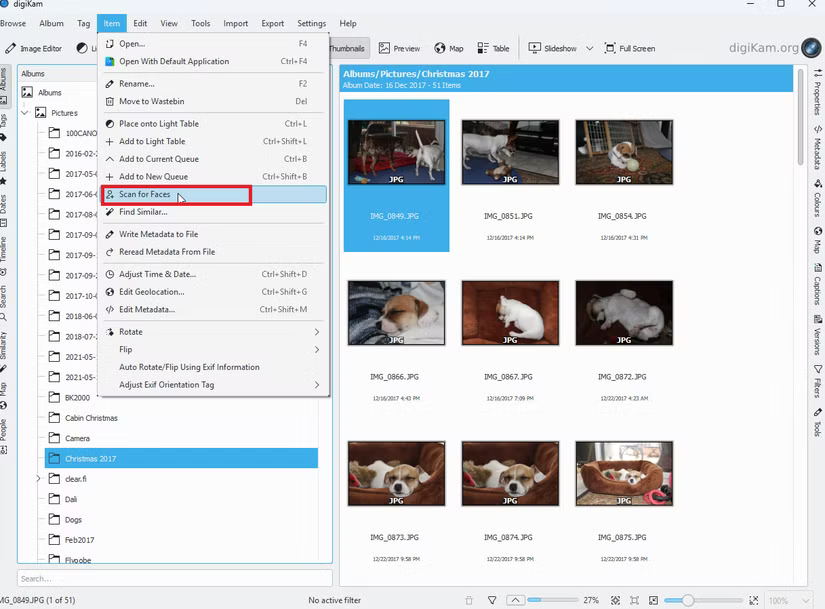 Une capture d'écran du gestionnaire de photos open source, DigiKam. Le menu contextuel est ouvert et la recherche de visages est surlignée en rouge.