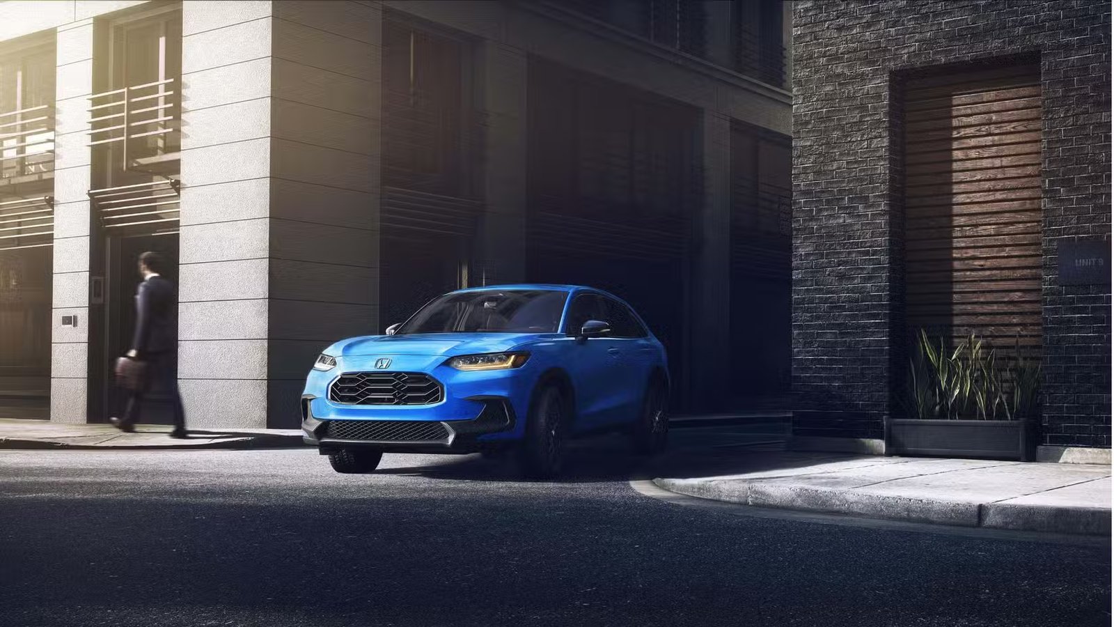 Plan dynamique 3/4 avant d'un Honda HR-V Sport 2026 bleu.