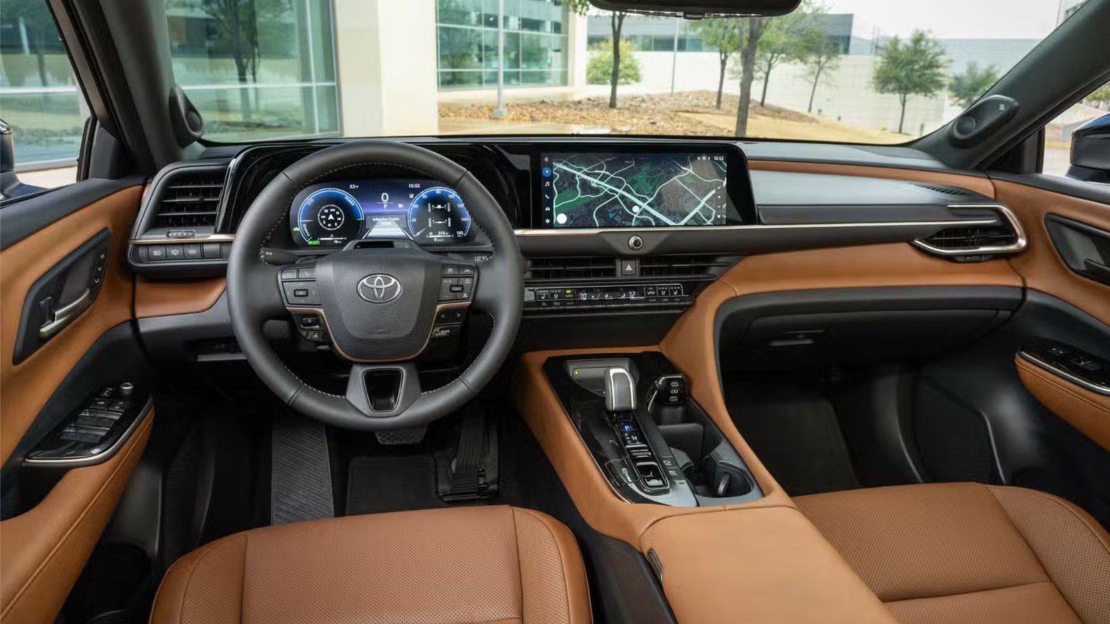 Gros plan du tableau de bord de la Toyota Crown Signia Limited 2025, montrant le volant et l'écran d'infodivertissement.