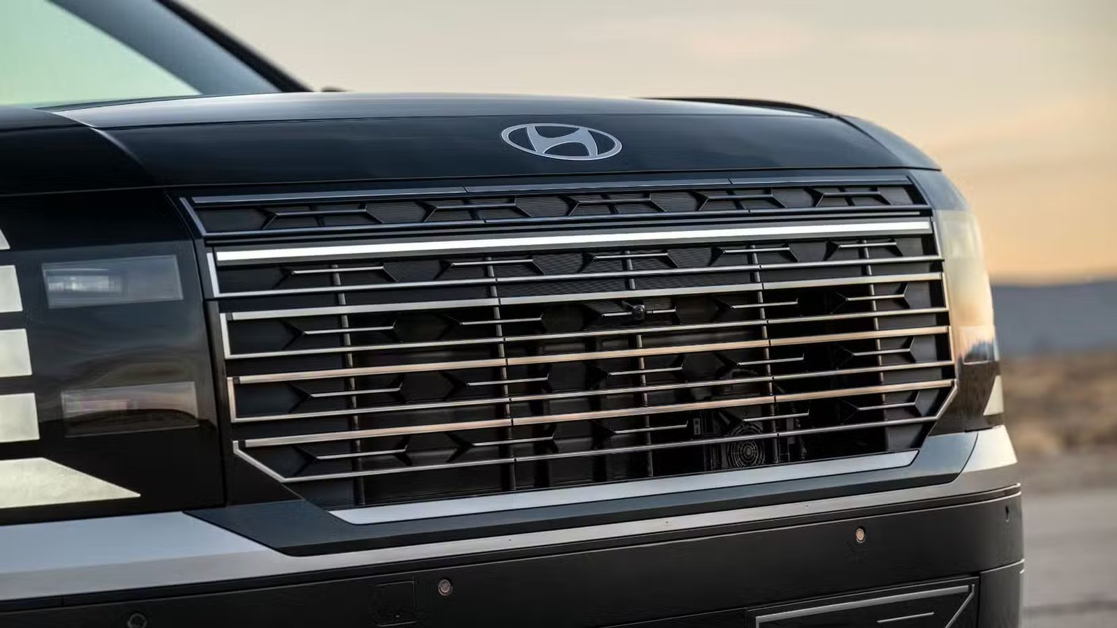 Gros plan de la calandre d’une Hyundai Palisade Hybrid Calligraphy 2026.