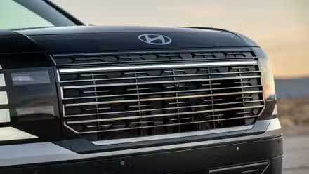 Gros plan de la calandre d’une Hyundai Palisade Hybrid Calligraphy 2026.