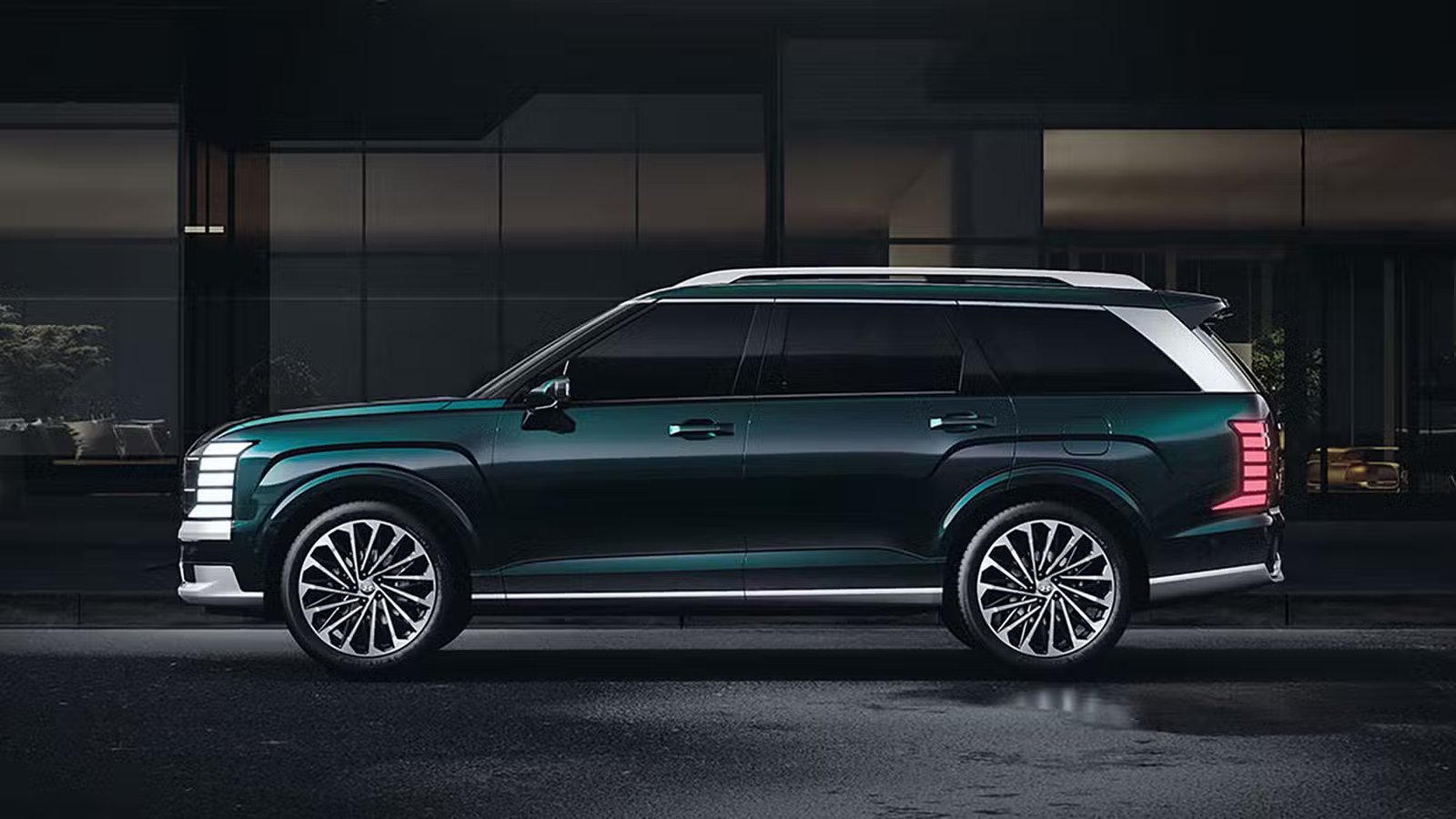Hyundai Palisade 2026 de profil latéral vert garé en ville