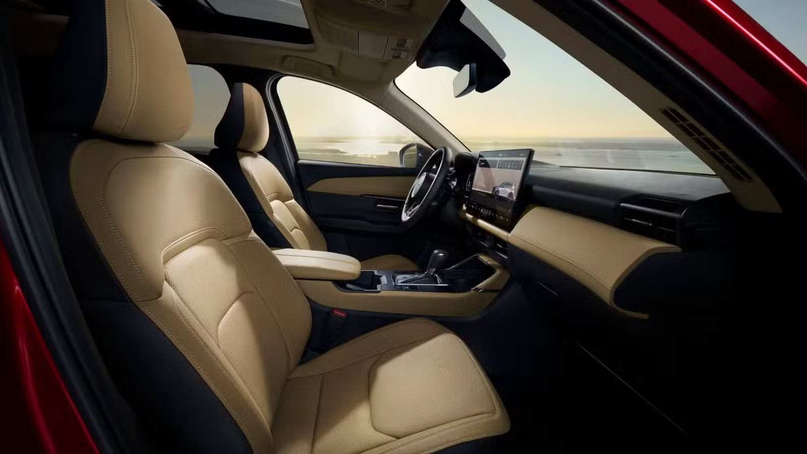 Plan des sièges avant et du tableau de bord à l'intérieur de l'habitacle d'un Mazda CX-5 2026.