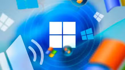 Logo Windows 11 avec une icône de haut-parleur et quelques anciens logos Windows.