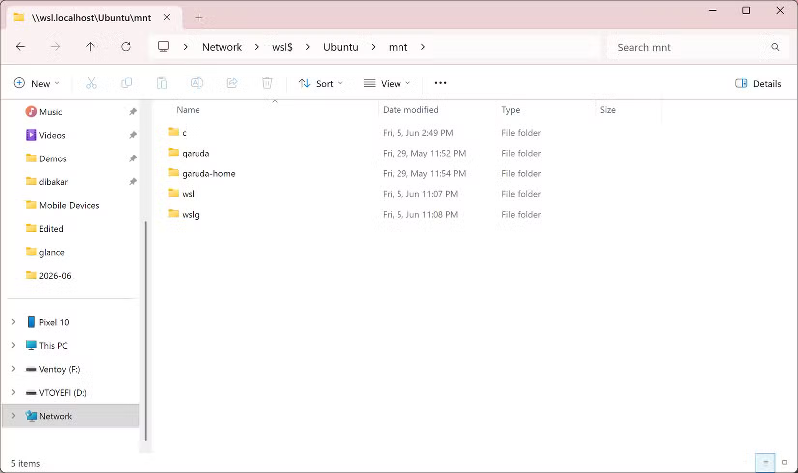 Explorateur de fichiers affichant le répertoire Ubuntu WSL mnt contenant les sous-dossiers c, garuda, wsl et wslg.