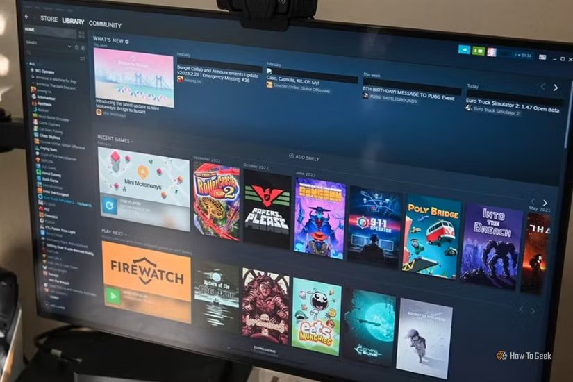 Vue d'accueil de la bibliothèque de bureau Steam affichant les vignettes des jeux récents, les nouvelles mises à jour et la barre latérale des jeux.